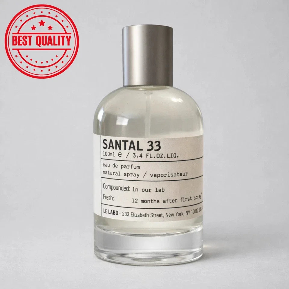 A clear glass bottle of Santal 33 Eau de Parfum with a silver cap and a cream-colored label, shown against a light gray background with a red 'Best Quality' stamp in the top-left corner.