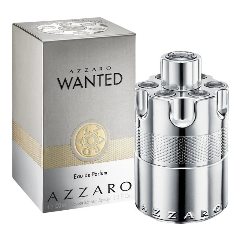 Azzaro Wanted Eau de Parfum bottle and its packaging box, featuring a metallic silver design with a gold circular emblem on the box.