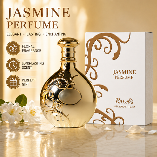 A decorative gold perfume bottle with ornate scrollwork and a matching white box labeled Jasmine Perfume by Roxelis, shown on a warm beige surface with flowers and text callouts.