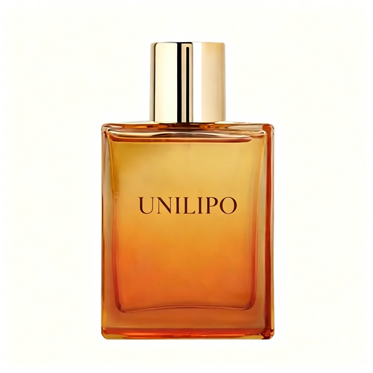 A rectangular glass perfume bottle with a warm amber-to-golden gradient, featuring a shiny gold cylindrical cap and the brand name 'UNILIPO' printed in black on the front, set against a plain white background.