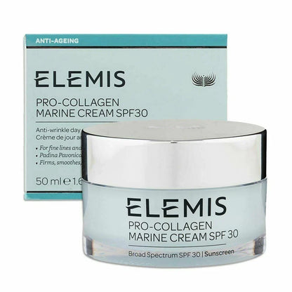 Elemis Pro-Collagen Marine Cream SPF 30 in a clear glass jar with a silver lid, shown in front of its light blue and teal packaging box.