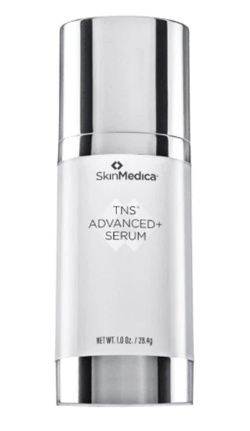 SkinMedica TNS Advanced+ Serum in a sleek, reflective silver cylindrical bottle with a white label, set against a plain white background.