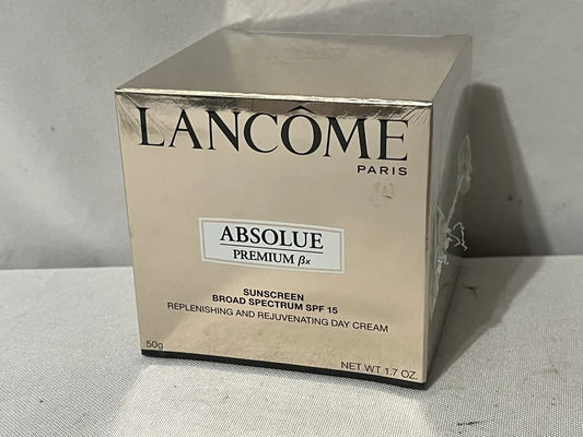 Lancème Absolue Premium ¼x skincare product packaging on a neutral background