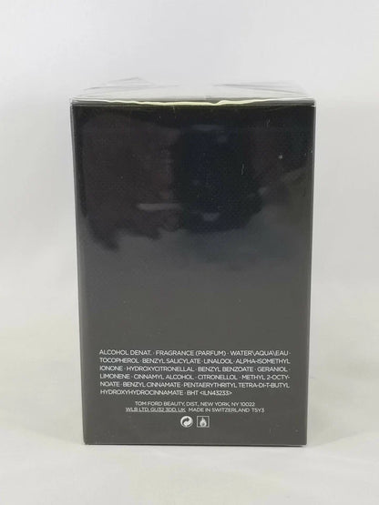 Tommy Hilfiger Alcohol Denat Fragrance box, showing the back of the black packaging with white text and a glossy finish, sealed in plastic.