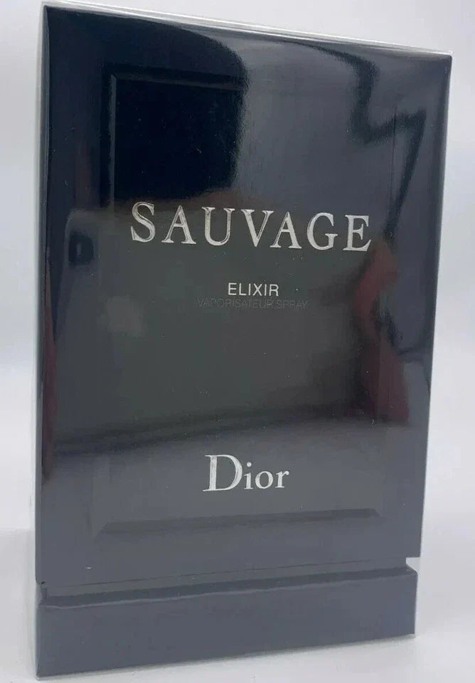 Dior Sauvage Elixir fragrance box in glossy black packaging with silver lettering, photographed on a light gray background.