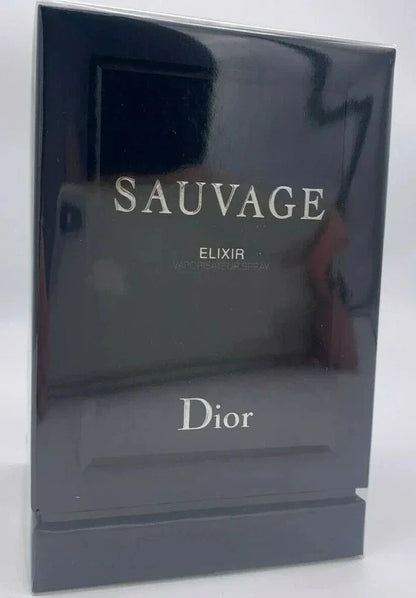 Dior Sauvage Elixir fragrance box in glossy black packaging with silver lettering, photographed on a light gray background.